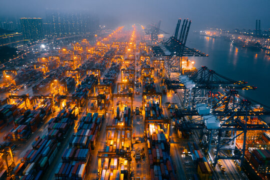 Aerial View of Busy Container Port Terminal at Night