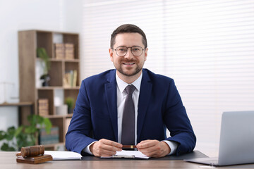 Obraz premium Portrait of professional lawyer at desk in office