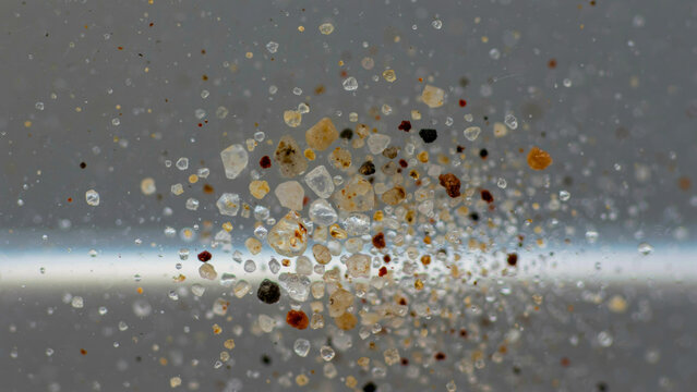 Abstract cloud of colorful micro particles and debris suspended