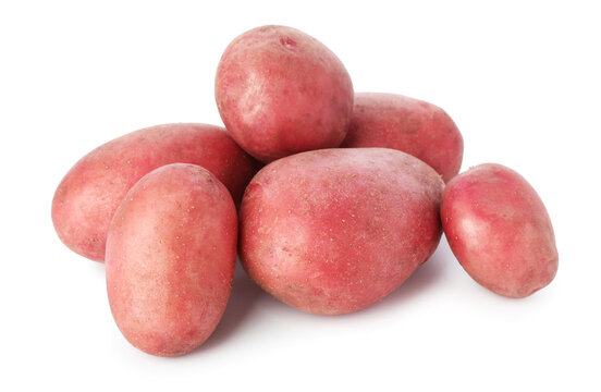 Many ripe red potatoes isolated on white
