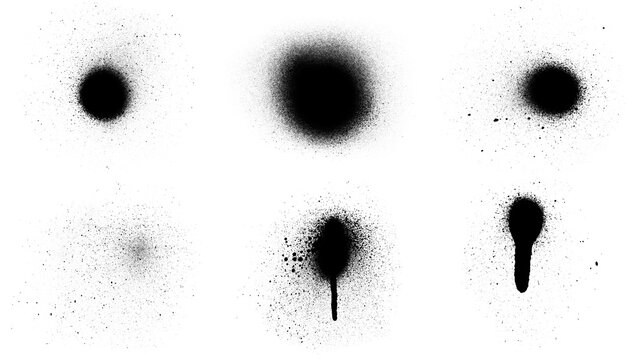 Set of black spray paint ink splatters and dots with dripping texture for artistic design elements and urban graffiti style graphic effects