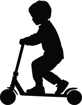 Silhouette of young boy riding kick scooter active childhood lifestyle.