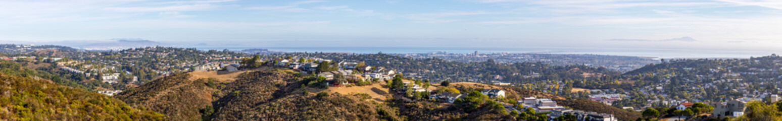 Fototapeta premium Valley homes panoramic view from Top of the World vista point in Belmont, San Mateo County, California