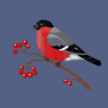 Red bullfinch bird on a branch with red berries embroidery design. Folk needlework stitch style. Fashion clothing patches stickers print. Blue background hand-stitched vector art.
