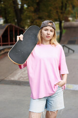 Stylish woman with skateboard in skate park © New Africa