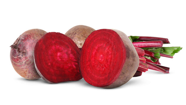 Whole and sliced beets isolated on white