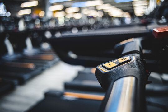 Treadmill Handrail In The Gym's Cardio Area With Treadmills In Close Up Veiw