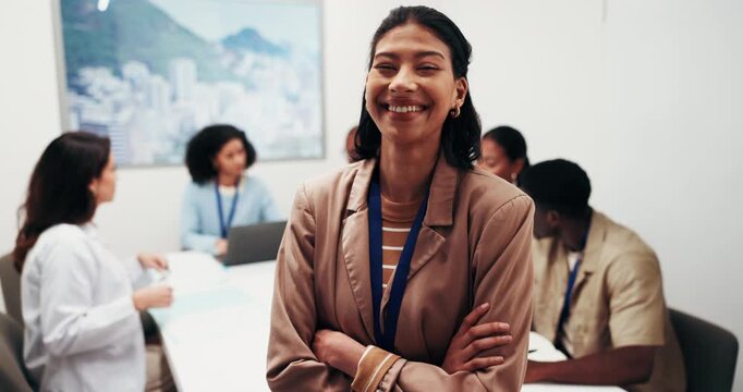 Meeting, face and woman with doctors, healthcare admin or team for financial planning. Portrait, hospital and happy worker with crossed arms for medical insurance, budget or finance advisor at clinic