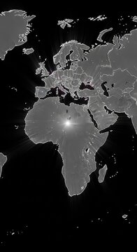 A luminous grayscale map of a large continental landmass emerges from deep shadows, featuring glowing borders and radiant light effects, grid, futuristic, lines