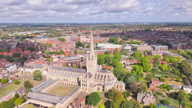 A slow rising view of the historic 11th century Cathedral in the city of Norwich in the UK
