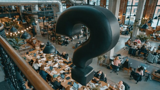 Large dark question mark symbol in busy modern cafe or coworking space with people