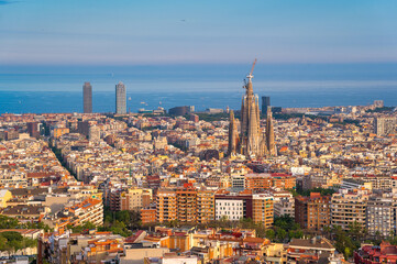 Elevated View of Barcelona City With Famous Sagrada Familia Church and Mediterranean Sea in the...