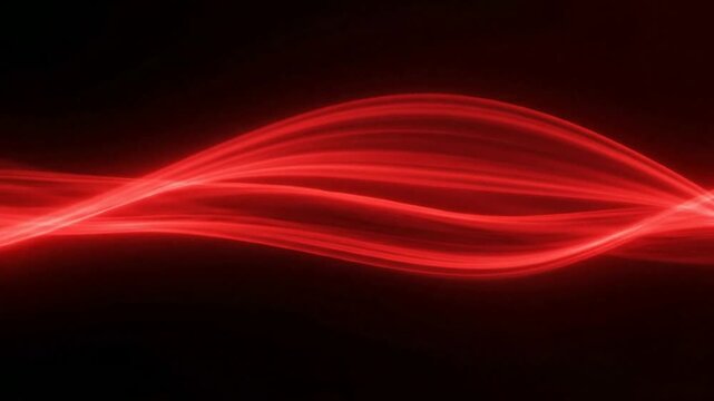 Abstract red light waves flowing on black background, smooth glowing energy lines motion for technology and digital