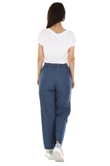Fototapeta premium Woman wearing denim pants on white studio background