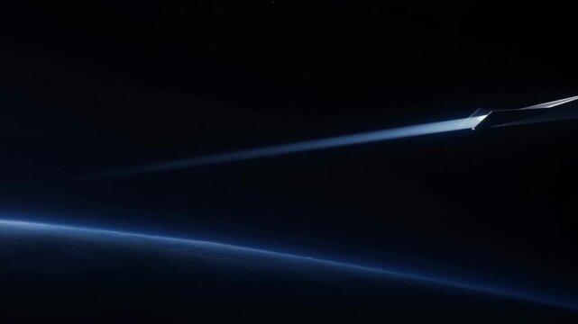 Tracking shot of spacecraft gliding across planet limb above atmosphere in low earth orbit with dark blue horizon and streaking light trail