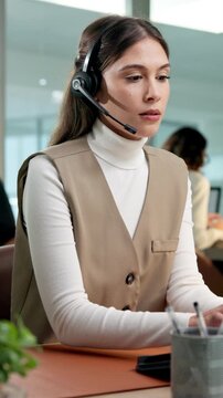 Conversation, smile and woman at call center with laptop, consultant and faq for customer service. Happy, agent and coworking in office with tech, virtual assistance or headset for telecom advisory
