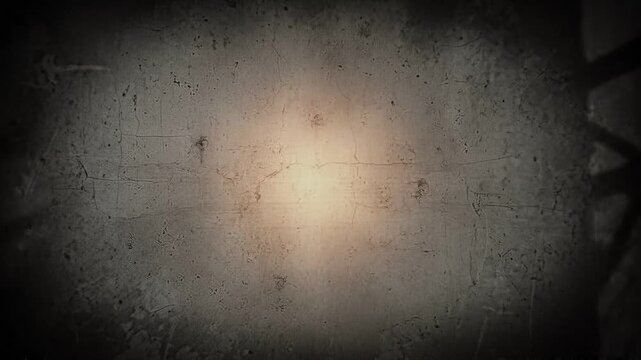 Grungy concrete wall with moving fence shadows and film flicker
