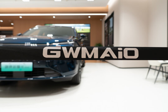Close up of GWM AiO sign on showroom barrier