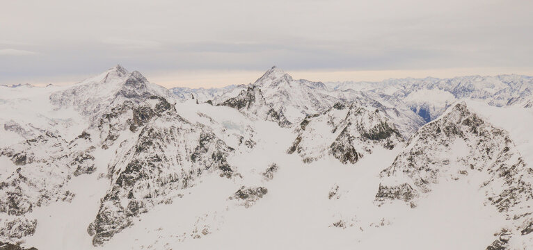 snow covered alpine mountain peaks