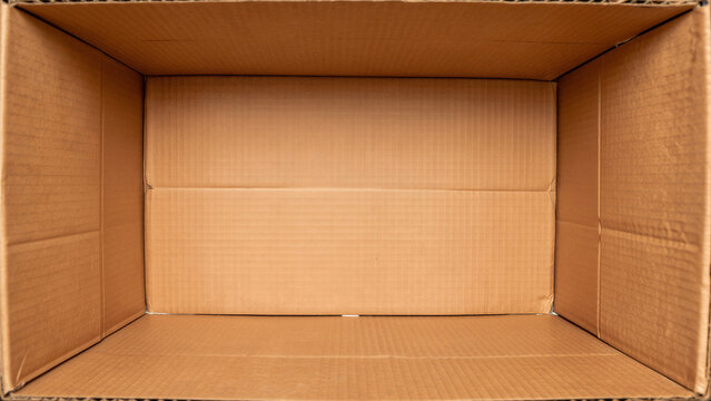 Inside view of an empty brown cardboard box