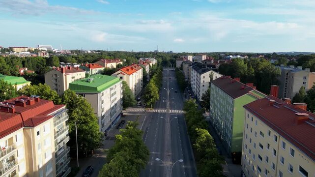 Munkkivuori, Helsinki, Finland. Aerial drone view of a residential neighborhood with apartment buildings, urban architecture, roads, and green surroundings, showcasing the peaceful character of the ar