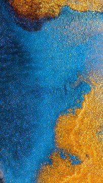 Mixing alcohol ink with vibrant colors in a creative display