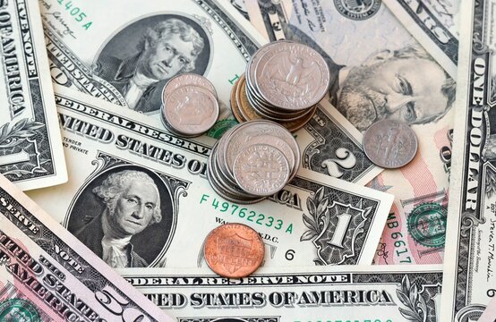 US dollar money 50 with 5 and 1 banknotes and coins on table. United States bills of USD currency