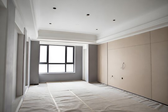 Hotel Room Fresh Ceiling Paint with Unpainted Feature Wall Protected Floor and Empty Lighting Points