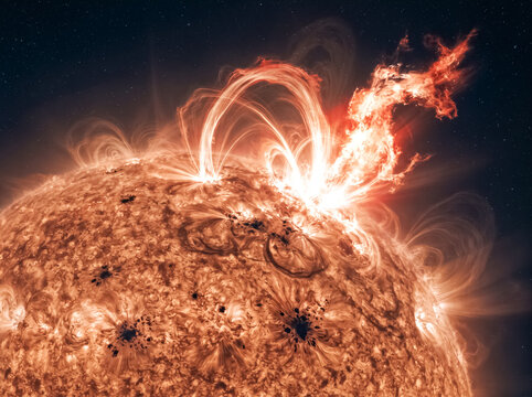 Solar Flare Eruption: A dramatic and powerful solar flare erupts from the surface of the sun, showcasing the immense energy and celestial beauty of our star.