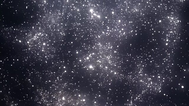 Sparkling silver dust particles floating in deep black void