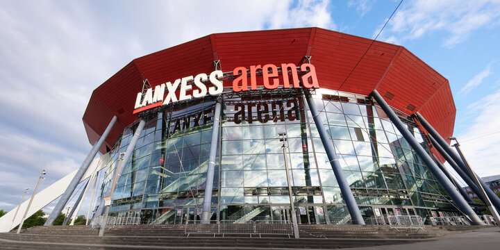 Cologne, Germany  August 31 2026: Wide-angle low perspective view of the modern Lanxess Arena event hall exterior with glass facade in Cologne-Deutz