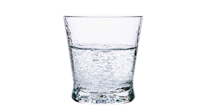 Isolated transparent glass of refreshing sparkling water with numerous bubbles, a healthy drink