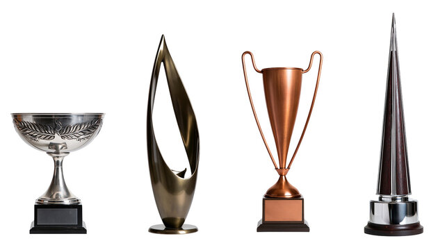 Isolated set of four distinct awards and trophies made of metal and wood for achievements