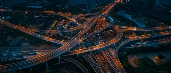 Aerial Night View of Highway Interchange Light Trails © toheartlove