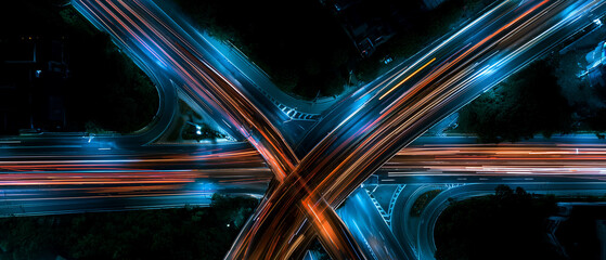 Aerial Night View of Highway Interchange Light Trails © toheartlove