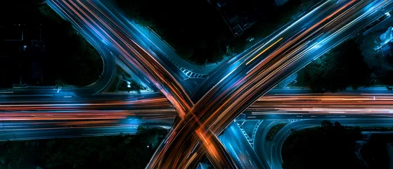 Aerial Night View of Highway Interchange Light Trails © toheartlove