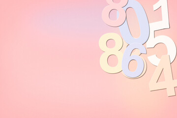 Pastel 3D numerals drift on a smooth pink backdrop, creating a playful, upbeat feel for countdown, age milestones, or celebratory design layouts. © Galina