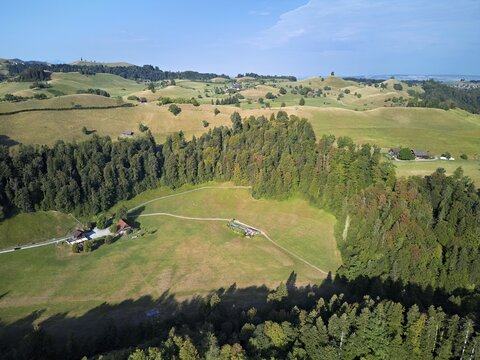 Parched, dry meadows in the Drumlin landscape, Sihlmatt in the foreground, hot summer 2026, Menzingen Canton of Zug, Switzerland