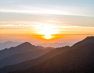 Fototapeta premium Golden Sunset Over Layered Mountains with Vibrant Sky