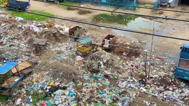 Polluted dumping ground filled with discarded plastic and industrial waste in a industrial area at Dhaka, Bangladesh
