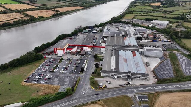 Ireland amazing aerials overview of meat processing plant next to the Suir River County Kilkenny Ireland