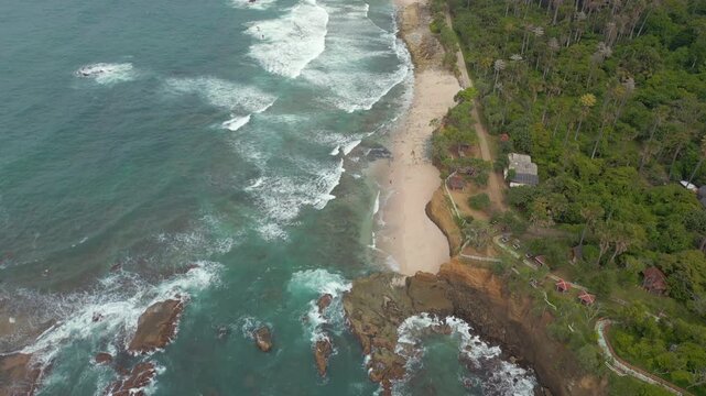Wild Rugged Indonesian Beach Pantai Papuma Near Jember East Java Drone Track In Pan 4K 60FPS