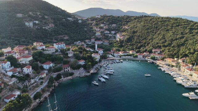 The unbelievably beautiful Kioni Bay, Ithaca, Greek Islands - drone reverse