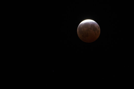 Total Lunar Eclipse Blood Moon Phase in Night Sky