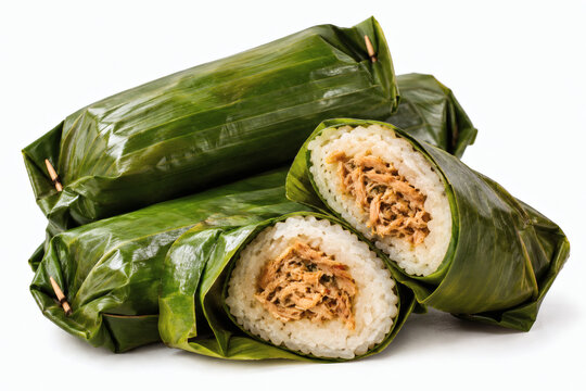 Traditional Indonesian lemper chicken sticky rice rolls wrapped in banana leaves isolated on white background