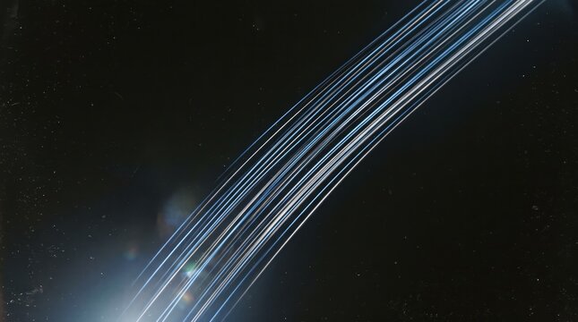 Satellite trails streaking across night sky starfield astrophotography, long exposure capture of artificial satellites moving in orbit creating linear light paths against dark