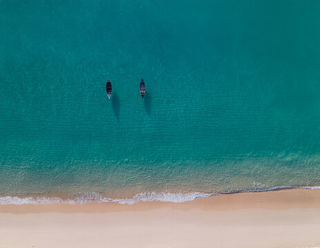 Aerial Top-Down View of Traditional Boats on Turquoise Tropical Water