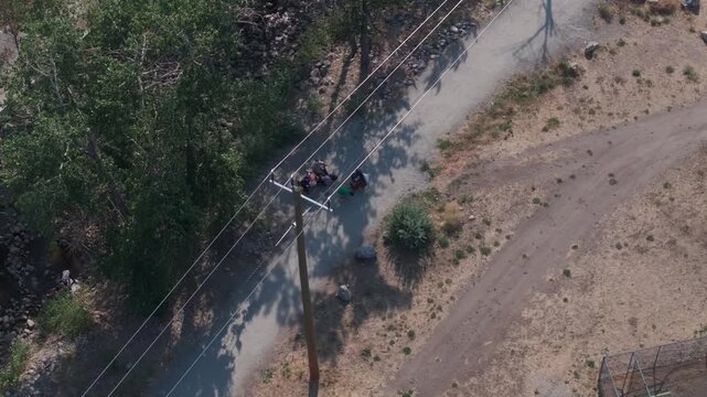 Aerial view of two homeless people outside in summer