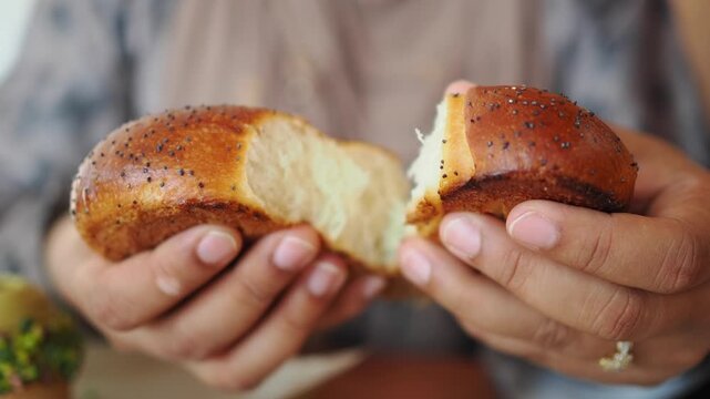Enjoying a fresh baked bun in a cafe setting
