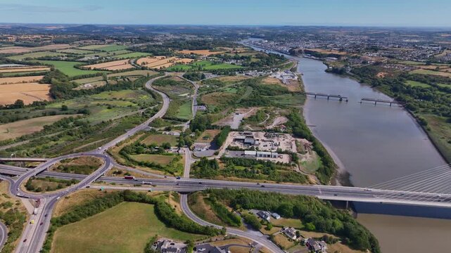 Aerial overview roundabout to Thomas Francis Meagher Bridge main route to Waterford City Ireland ,heavy traffic inbound and outbound